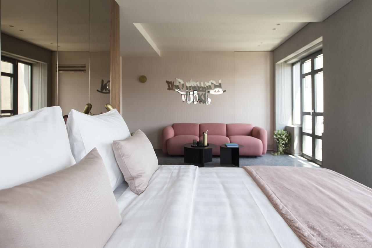 Perianth Hotel Athén Kültér fotó A bedroom at the hotel